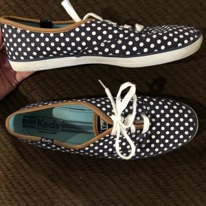 Navy blue polka dot keds.